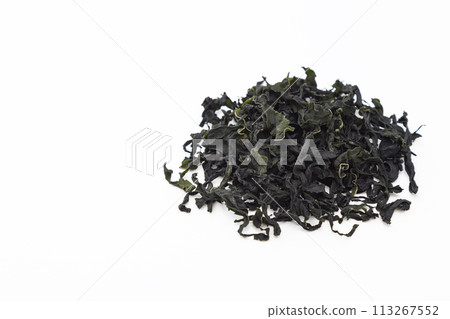 Dried wakame seaweed on white background 113267552