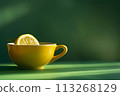 Sip of Sunshine: Fresh Orange Juice and Lemon Slice on Green Backdrop 113268129