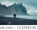 Mountain Magic: Traveling Couple Revels in Breathtaking Views from Iceland's Black Beach 113268136