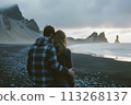Mountain Magic: Traveling Couple Revels in Breathtaking Views from Iceland's Black Beach 113268137