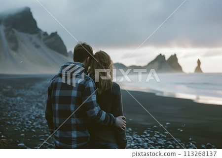 Mountain Magic: Traveling Couple Revels in Breathtaking Views from Iceland's Black Beach Mountain Magic: Traveling Couple Revels in Breathtaking Views from Iceland's Black Beach 113268137