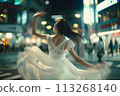 Mystical Moves: Enchanting Night Dance Performance by a Woman on Japan's Streets 113268140