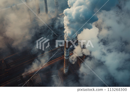 Sunrise Productivity: Industrial Factory Awakens with Billowing Smoke 113268300