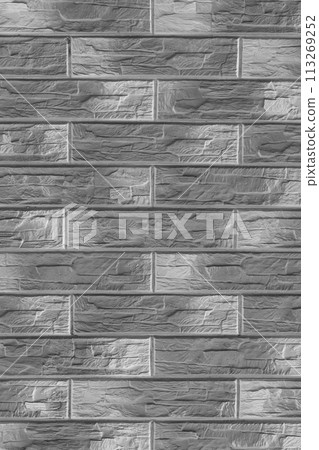 Vertical grey abstract pattern brickwork masonry brick wall texture background facade backdrop 113269252