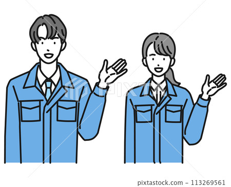 A man and a woman in work clothes giving directions (upper body) 113269561