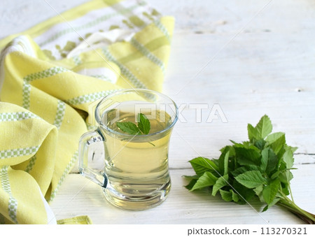 Herbal tea from flower of Aegopodium podagraria, commonly called ground elder or bishop weed. Herbal tea from flower of Aegopodium podagraria, commonly called ground elder or bishop weed. 113270321