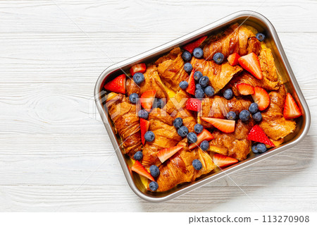 berry croissant casserole in baking dish, top view 113270908