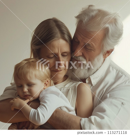 Grandparents and toddler sharing a loving embrace 113271118