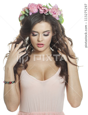 Perfect brunette woman with fresh flower on her head. Spring, cosmetic, 113275297