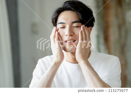 Young men doing skin care Young men doing skin care 113275677