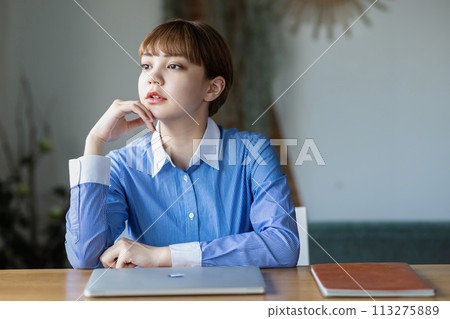 Young women taking online lessons Young women taking online lessons 113275889