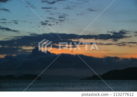 Sunset sky and sea with various clouds, early summer, 230723pm 113277612