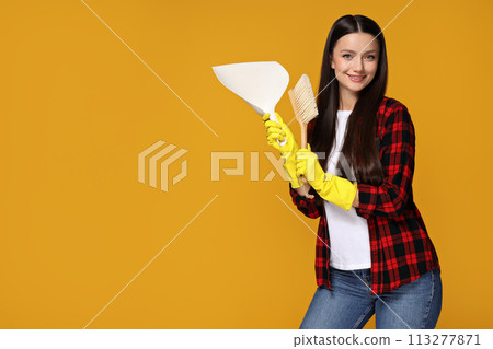 Housewife, in rubber gloves, on a bright background. Housewife, in rubber gloves, on a bright background. 113277871