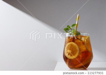 A glass of delicious cold tea on a white background 113277931