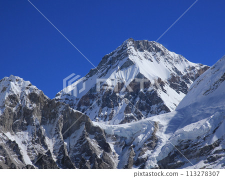 Azure blue sky over Changtse, high mountain in Tibet seen from Kala Patthar, Nepal. 113278307