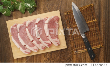 Pork loin on a cutting board 113278564