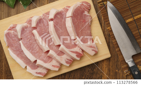 Pork loin on a cutting board 113278566
