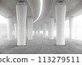 A large, empty parking lot with a foggy atmosphere 113279511