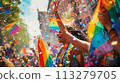 Exuberance at Pride: Laughter and Confetti in the Sun 113279705