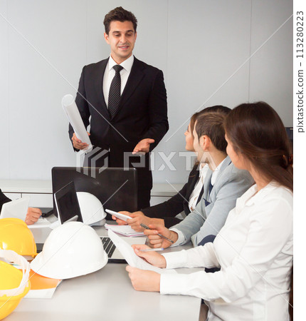 Building chief speech at meeting in office 113280223