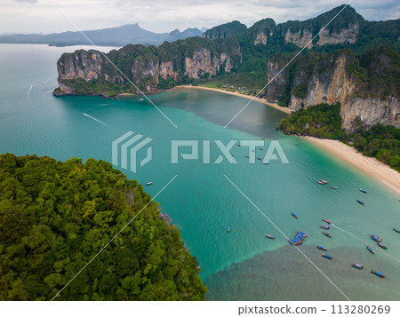 An aerial view of a Railay beach of water surrounded by mountains 113280269