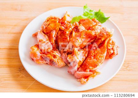 Chicken wings marinated in sweet and spicy sauce Chicken wings marinated in sweet and spicy sauce 113280694