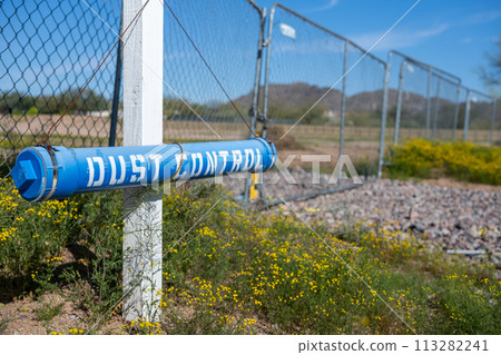 Dust Control Plan posted outside a construction project in the southwest USA Dust Control Plan posted outside a construction project in the southwest USA 113282241