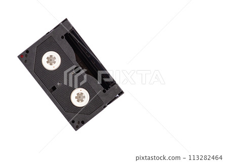 The tapes for recording 90s videos such as movies, games, songs, music. close up, copy space on right for the design or text. nobody, white background 113282464