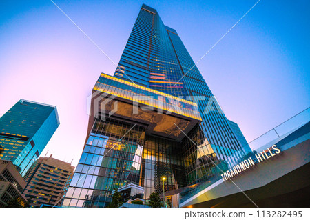 Tokyo cityscape in Japan. Today's opening of Toranomon Hills Station Tower (Toranomon Hills Station). Shining in the evening skyline... 113282495