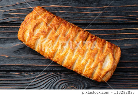 Golden Puff pastry stuffed with sausage and cheese Golden Puff pastry stuffed with sausage and cheese 113282853