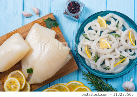 Squid rings and tubes with lemon Squid rings and tubes with lemon 113283503