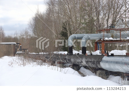 The main provides the city with hot water. Selective focus. The large pipes  113284213