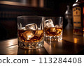 Two whiskey drinks on the wood counter in the bar 113284408