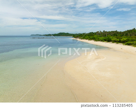 Aerial view of clear water on sandy beach in Santa Fe, Tablas, Romblon. Philippines. 113285405