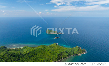 Blue sea and islets in El Nido. Coastline with ocean waves. Palawan, Philippines. Blue sea and islets in El Nido. Coastline with ocean waves. Palawan, Philippines. 113285406