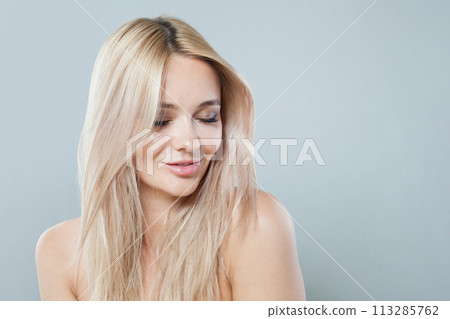 Smiling blonde model woman portrait. Facial treatment, cosmetology, skin care concept Smiling blonde model woman portrait. Facial treatment, cosmetology, skin care concept 113285762