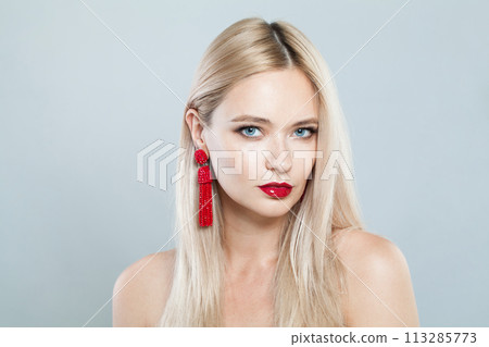 Elegant female face. Young blonde woman on white background 113285773