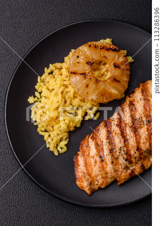 Delicious fresh grilled chicken fillet with spices and herbs 113286396