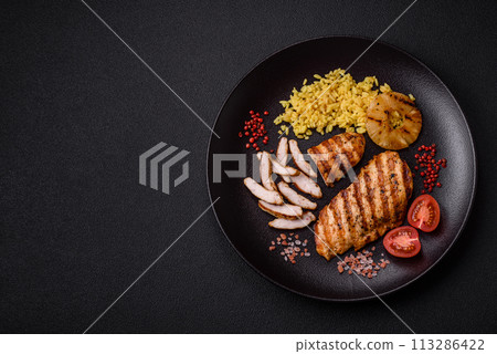 Delicious fresh grilled chicken fillet with spices and herbs Delicious fresh grilled chicken fillet with spices and herbs 113286422
