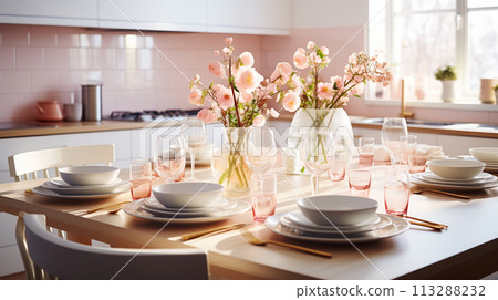 Modern kitchen with set of dishes pastel pink and cherry blossoms. Festive spring table setting in bright cozy kitchen 113288232