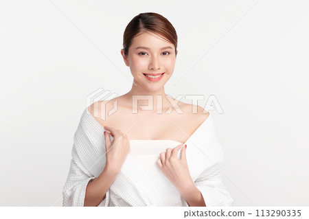 Beautiful young asian woman with clean fresh skin on white background, Face care, Facial treatment, Cosmetology, beauty and spa, Asian women portrait. Beautiful young asian woman with clean fresh skin on white background, Face care, Facial treatment, Cosmetology, beauty and spa, Asian women portrait. 113290335
