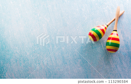 Cinco de Mayo holiday background made from maracas on pastel blue background. 113290384