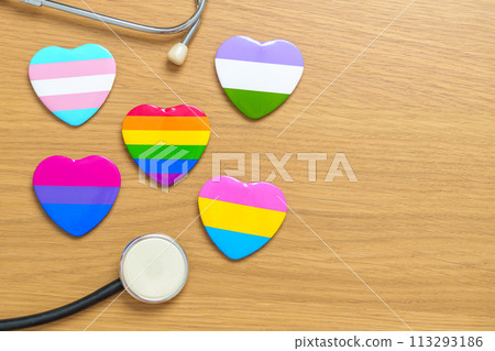 LGBT pride month concept or LGBTQ+ or LGBTQIA+. rainbow and colorful heart shape with Stethoscope for Lesbian, Gay, Bisexual, Transgender, Queer and Pansexual community 113293186