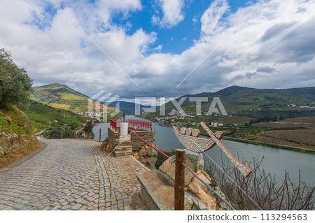 Douro Valley, Portugal, home of Port Wine, World Heritage Site, vast vineyards and the Douro Valley Douro Valley, Portugal, home of Port Wine, World Heritage Site, vast vineyards and the Douro Valley 113294563