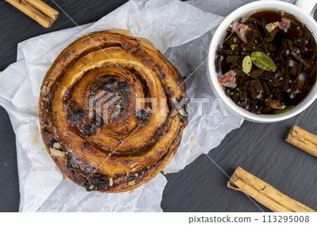 sweet delicious puff pastry with chocolate pieces in caramel sweet delicious puff pastry with chocolate pieces in caramel 113295008