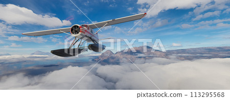 Airplane flying over mountains, lakes, and clouds. Sunny Da 113295568