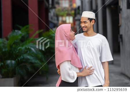 portrait happy muslim teen man and women couple lover friend standing together enjoy fun lifestyle outdoors portrait happy muslim teen man and women couple lover friend standing together enjoy fun lifestyle outdoors 113295639