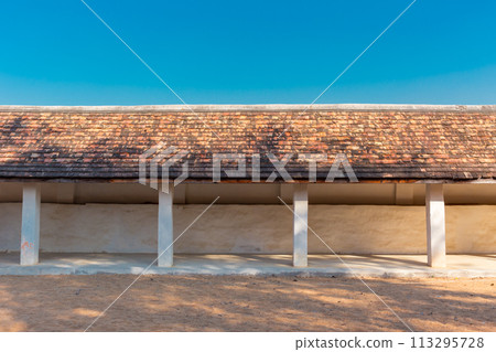 Lanna style eaves roof walk path way traditional architecture in historic place old northern asian temple roofing building design for background 113295728