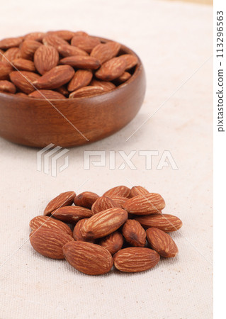 Almonds on a plate Almonds on a plate 113296563