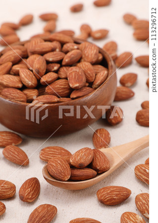 Almonds on a plate Almonds on a plate 113296712